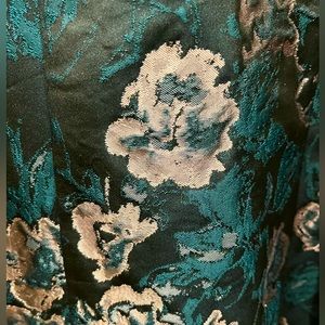 Silk gorgeous, tailored perfectly. Great for the holidays. Elegant